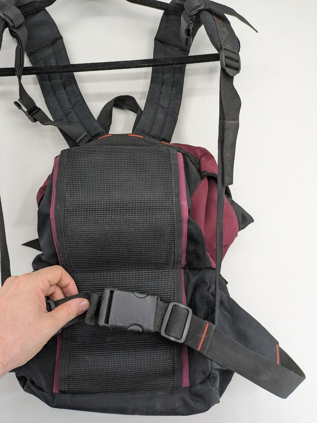 Adidas burgundy vintage rucksack with logo, Teflon fabric, and drawstring closure.