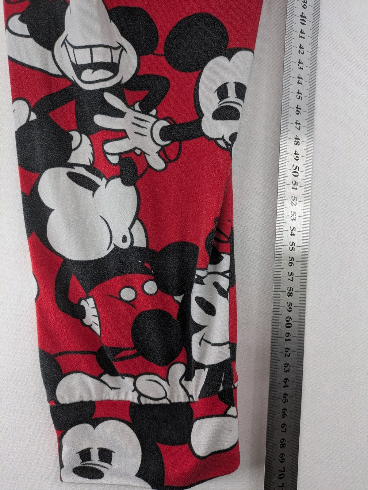 Disney loungewear set red and black with allover Mickey Mouse print and long sleeves.