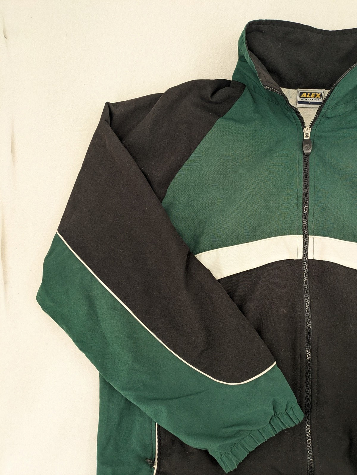 Alex Athletics multi jacket vintage colorblock design with zip, stand collar, and elastic cuffs.