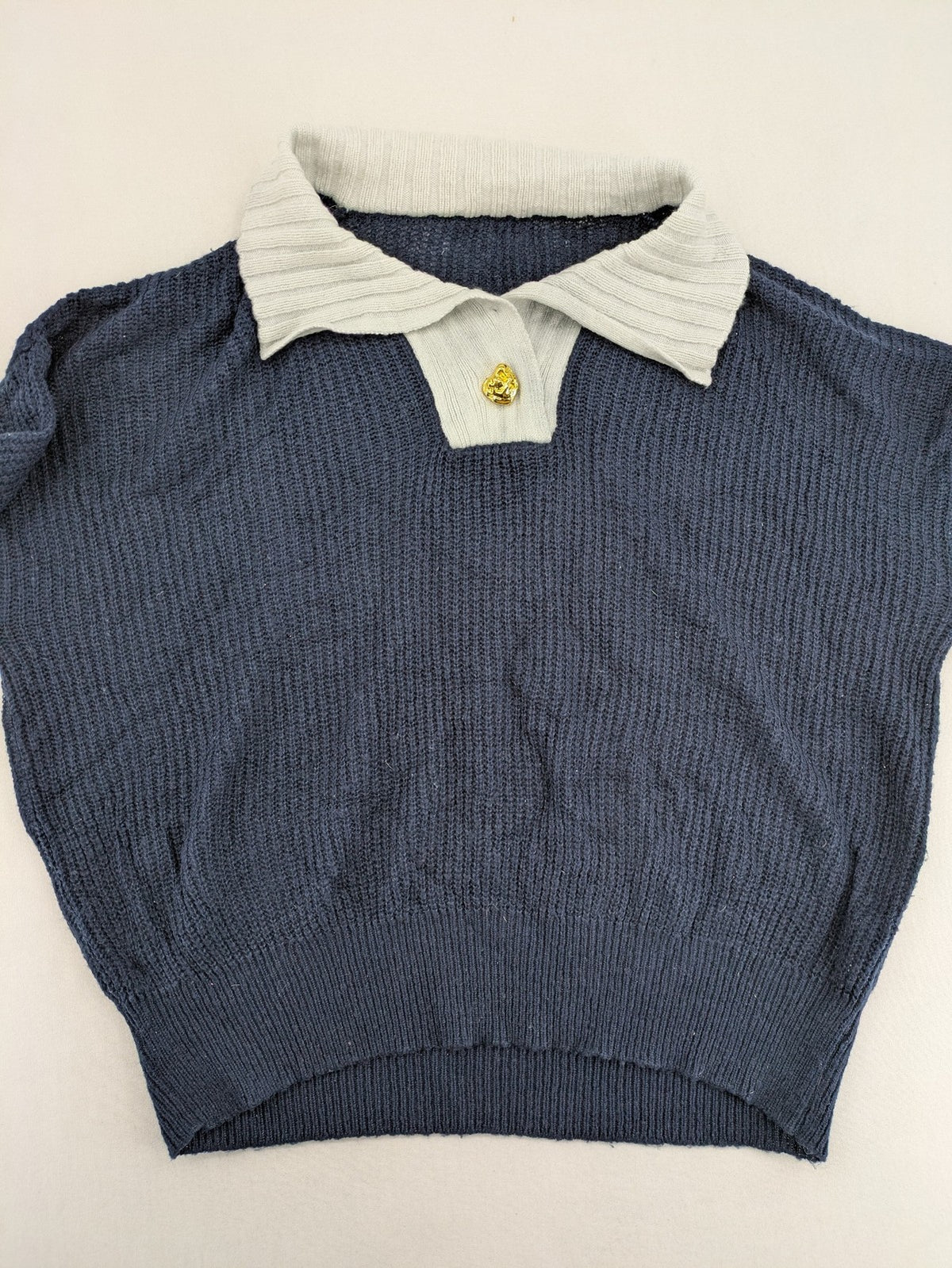 Dazy navy turtle neck jumper with contrasting collar and gold heart button detail.