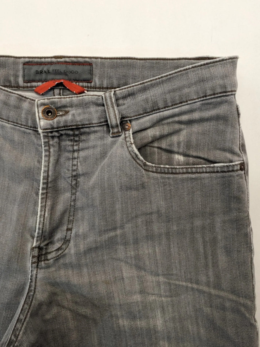 BRAX grey straight jeans with classic 5-pocket style and washed denim finish.