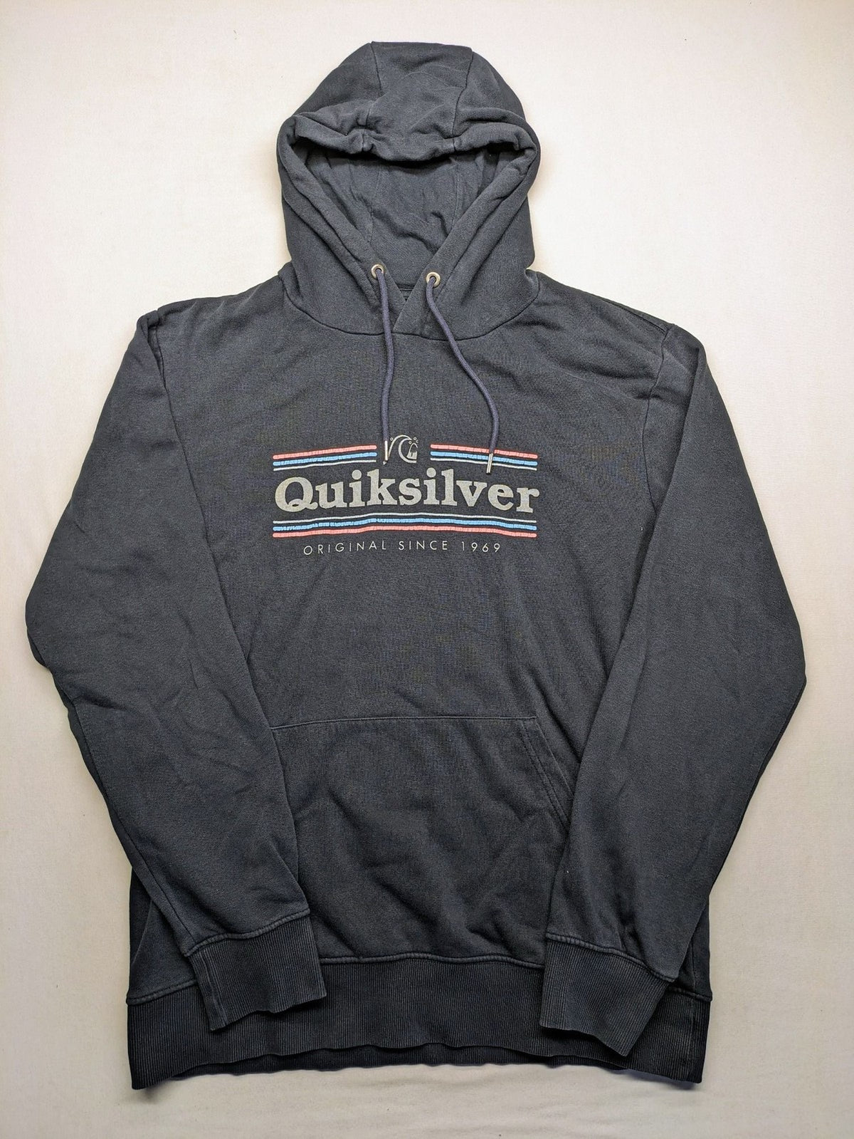 Quiksilver grey hoodie with logo graphic, kangaroo pocket, and adjustable hood.