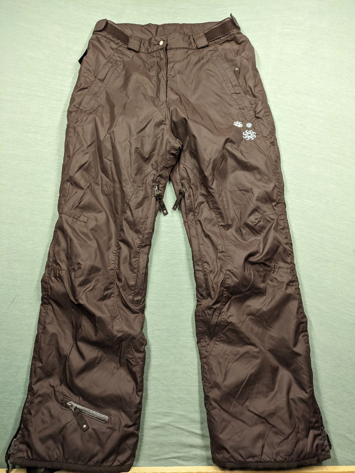 Thinsulate black and blue ski jumpsuit with hood and zippered pockets.