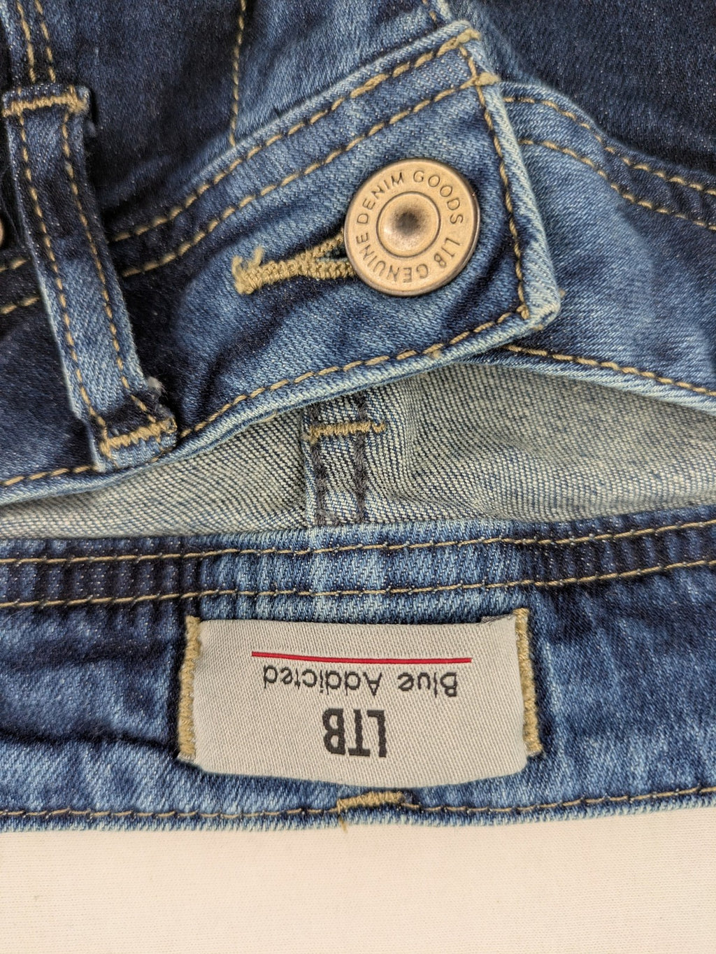 LTB blue bootcut jeans with classic 5-pocket design and low-rise fit.