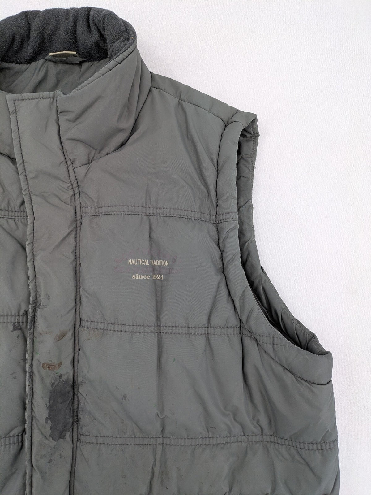 Camargue grey quilted jacket with fleece collar and buttoned pockets.