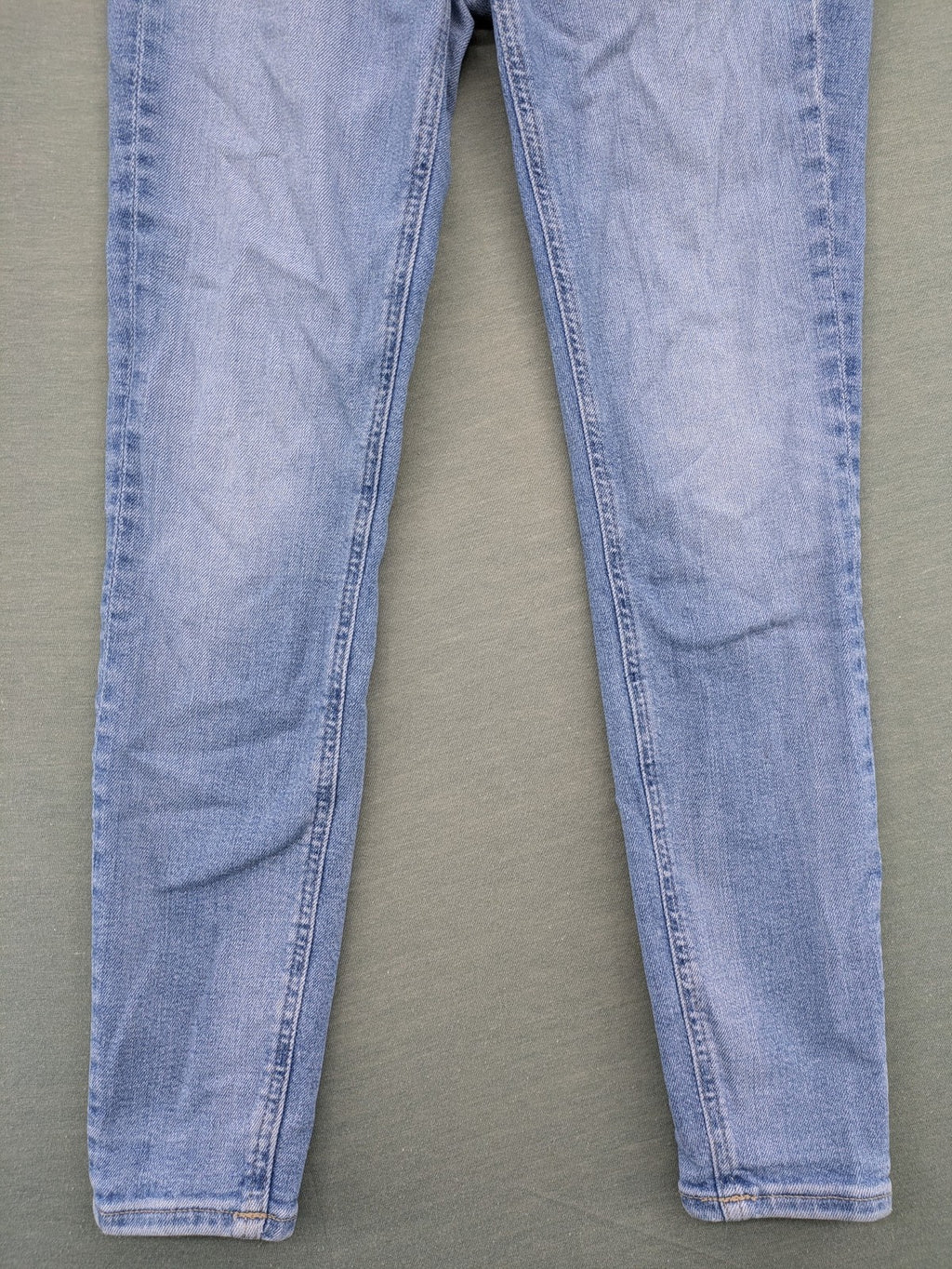 Calvin Klein Jeans blue high rise super skinny ankle jeans with logo patch and stretch material.