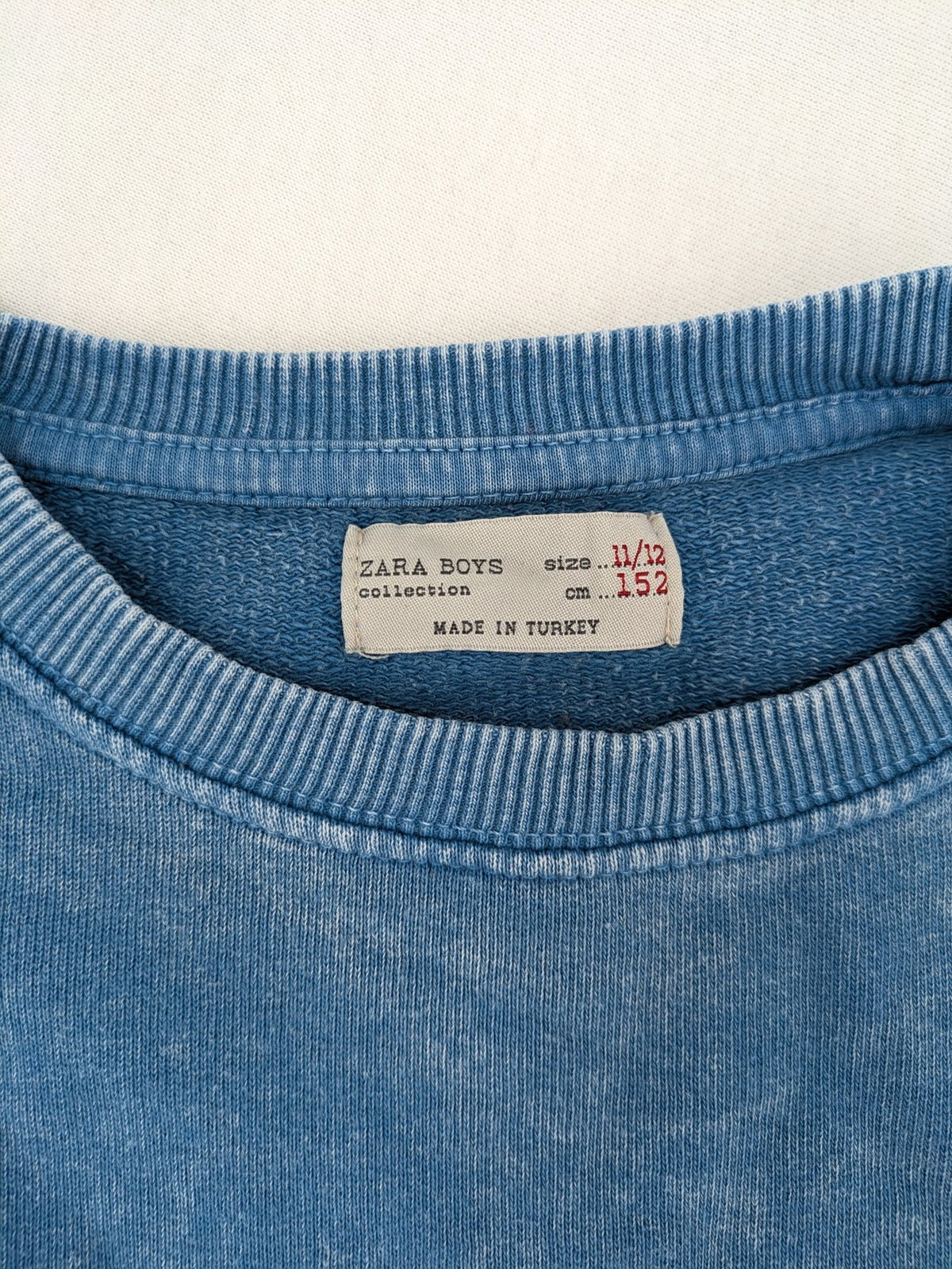 Zara turtle neck jumper blue distressed with graphic prints and patches, size 152.