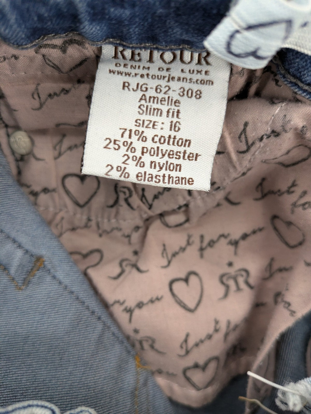 Retour blue slim fit jeans with classic 5-pocket style and adjustable waistband.