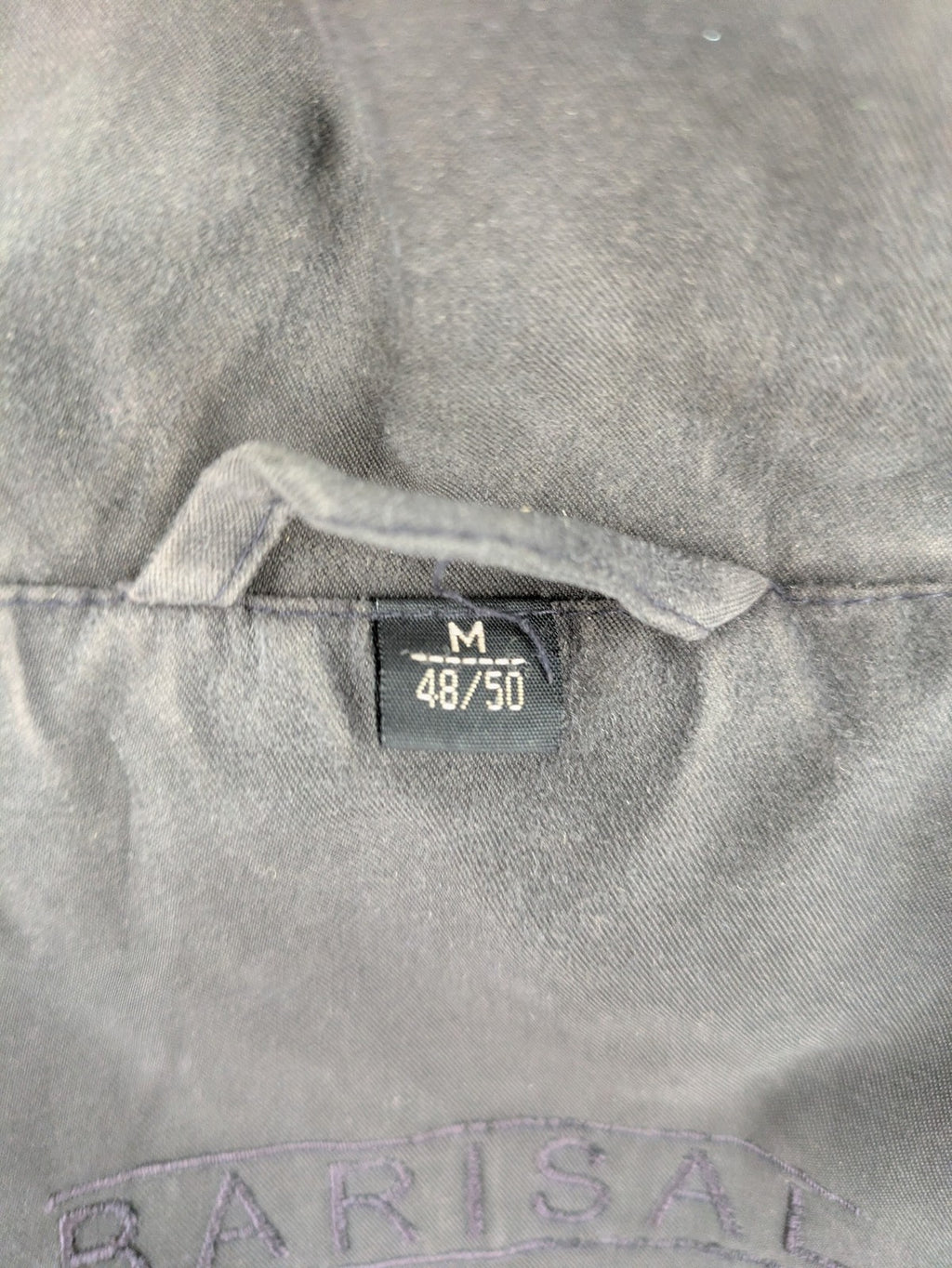Barisal grey coat with hood, cargo pockets, and checkered lining detail.