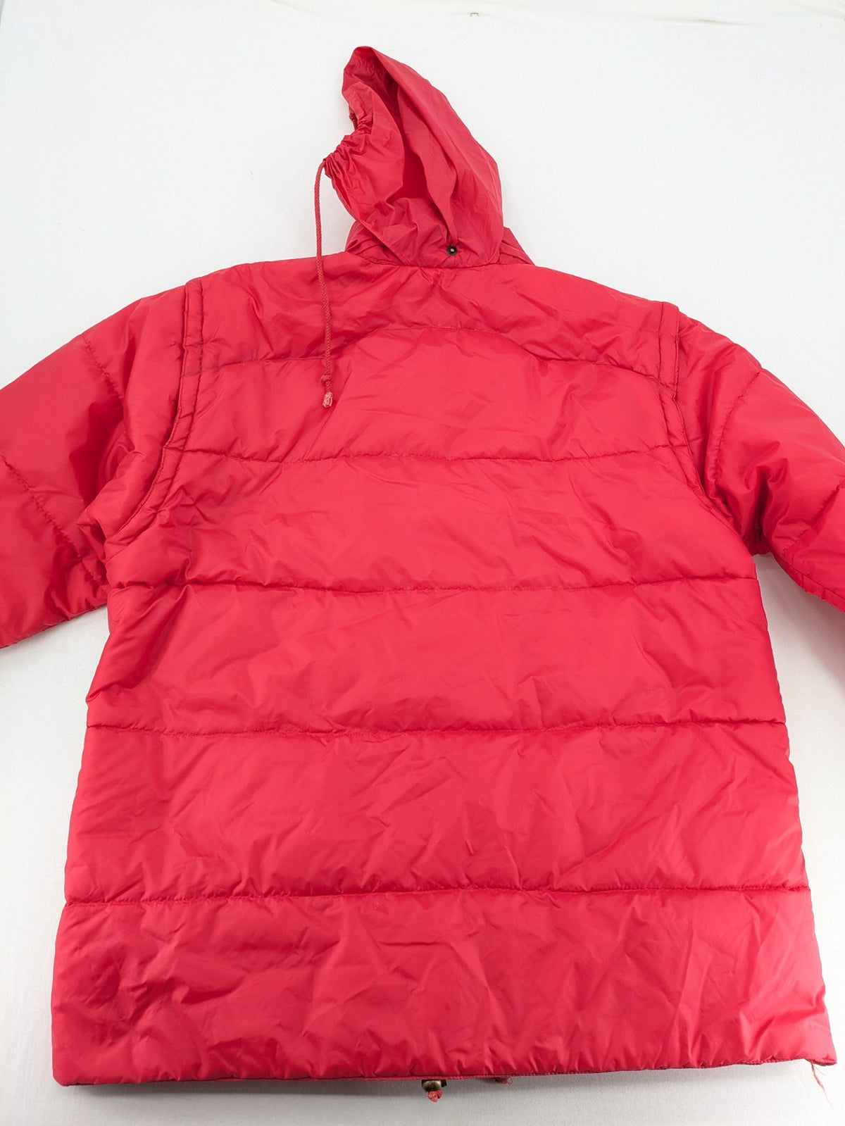 Rox red puffer vest with detachable sleeves and hood, vintage style.