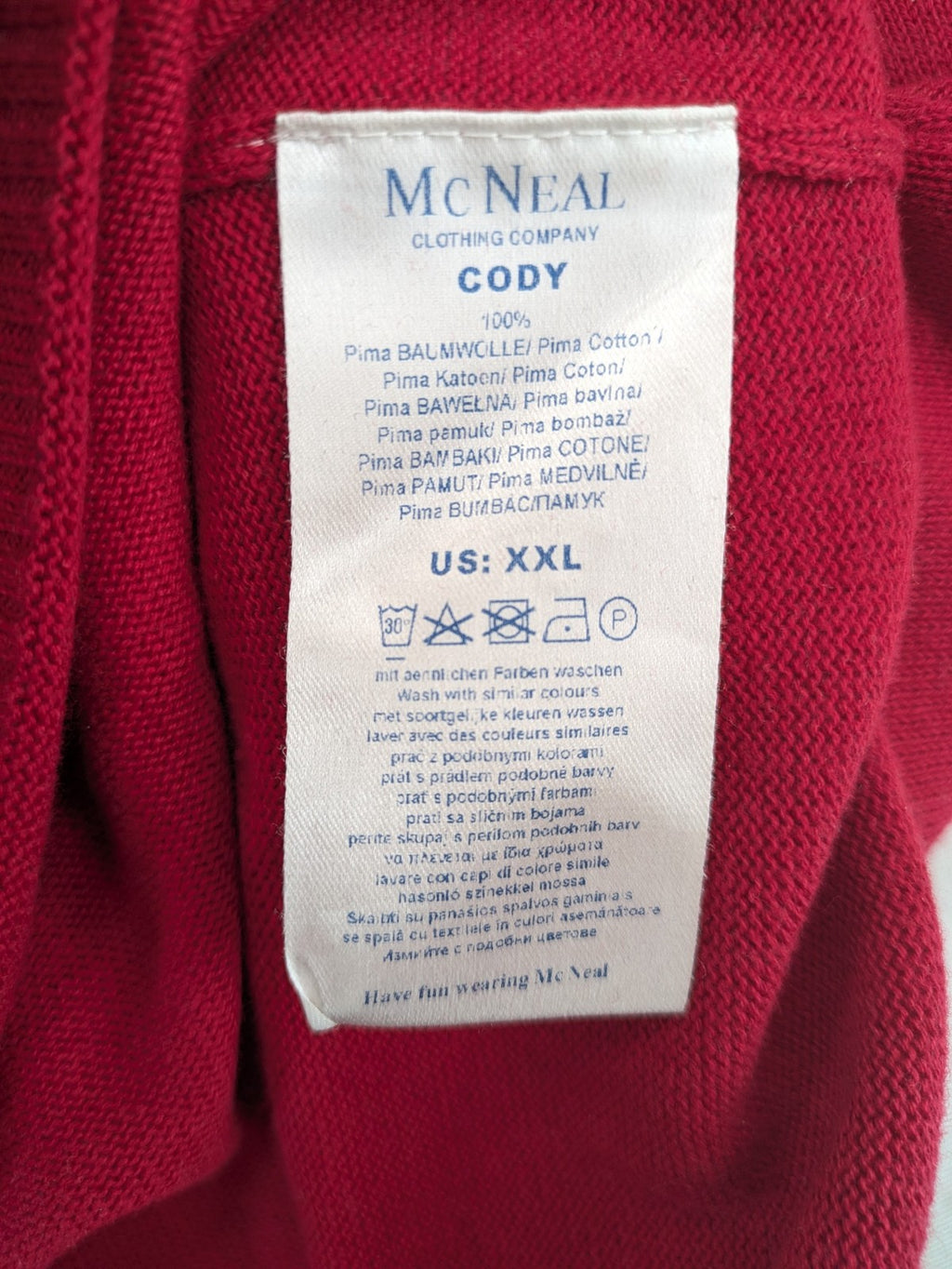 McNeal red turtle neck jumper V-neck design with ribbed cuffs and hem.