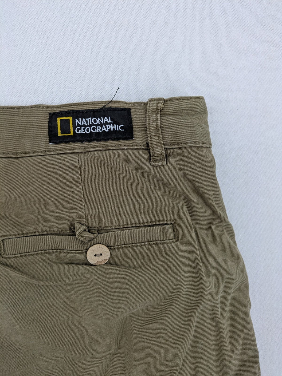 National Geographic khaki shorts flat front design with subtle logo patch