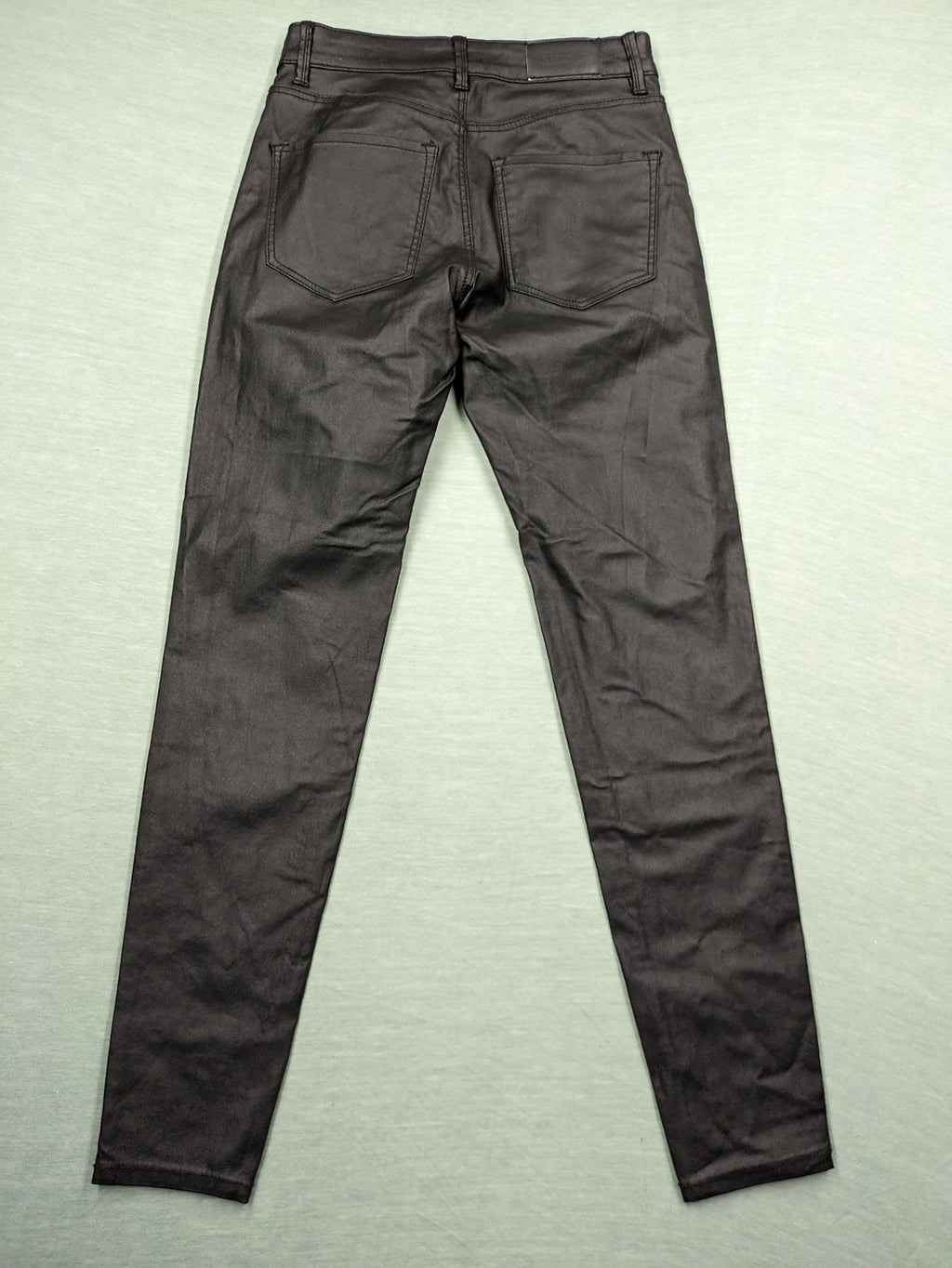 Stradivarius black coated skinny jeans faux leather finish stylish silhouette