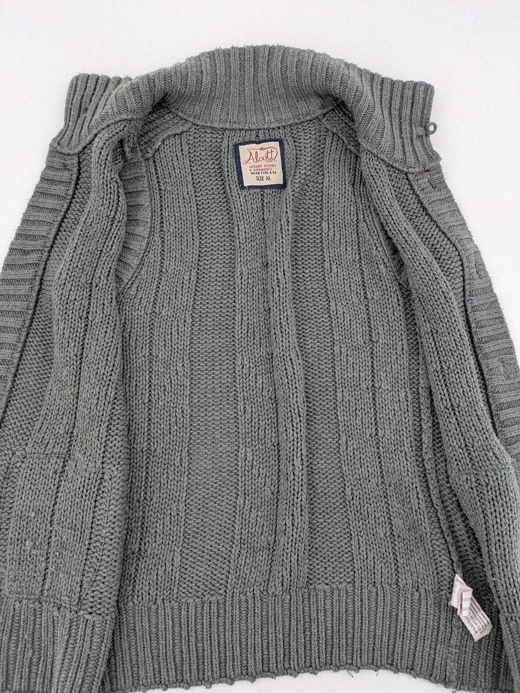 alcott grey turtle neck jumper cable knit pattern with ribbed collar and pockets