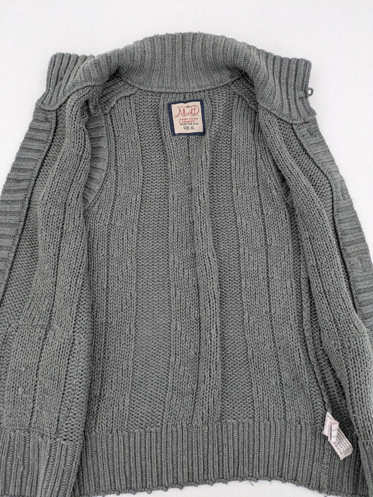 alcott grey turtle neck jumper cable knit pattern with ribbed collar and pockets