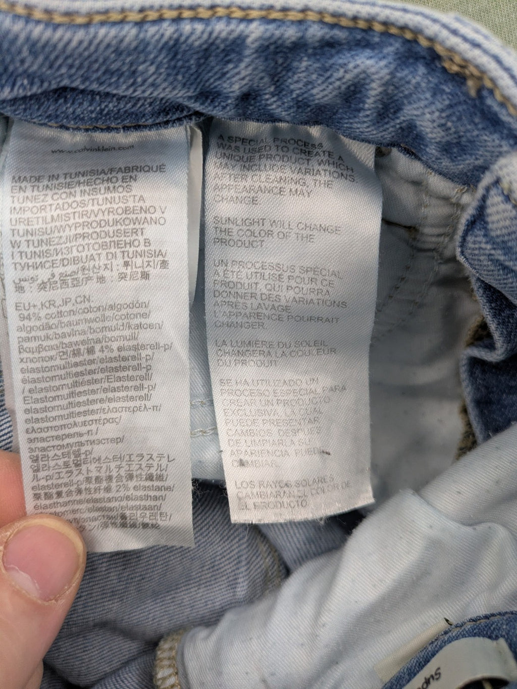 Calvin Klein Jeans blue high rise super skinny ankle jeans with logo patch and stretch material.