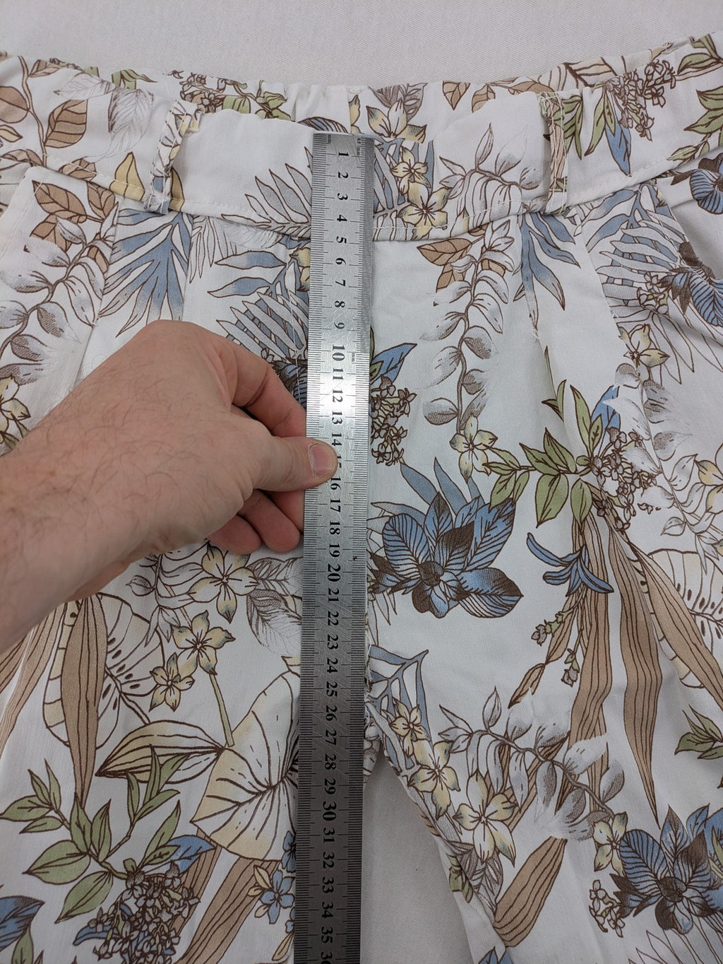 Made in Italy multi pants tropical floral pattern cotton-viscose blend on white background.