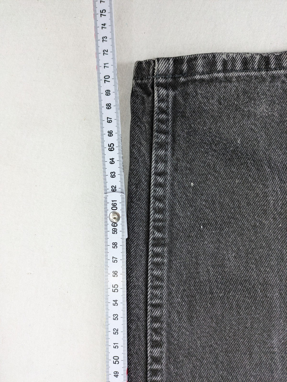 Maverick black straight jeans faded wash with iconic logo on back patch.