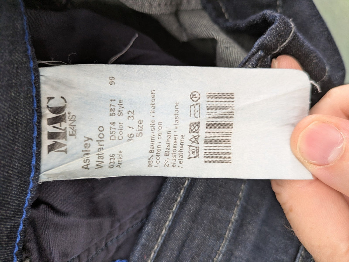 Mac Jeans blue straight jeans dark wash with subtle fading and stretch denim material.
