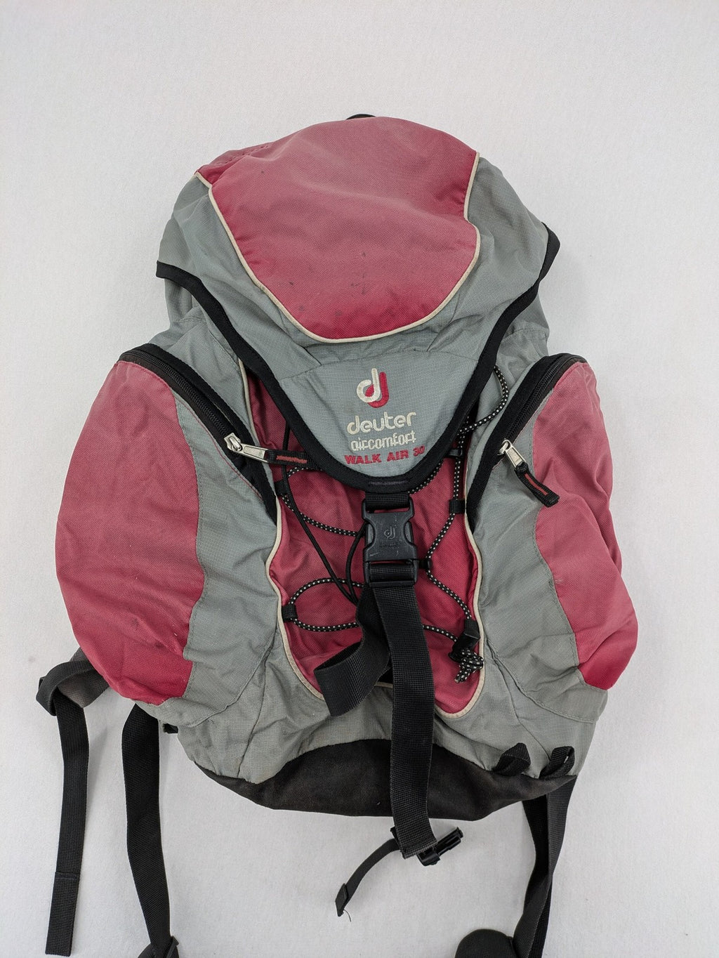 Deuter grey and pink Aircomfort Walk Air 30 rucksack with mesh back system.
