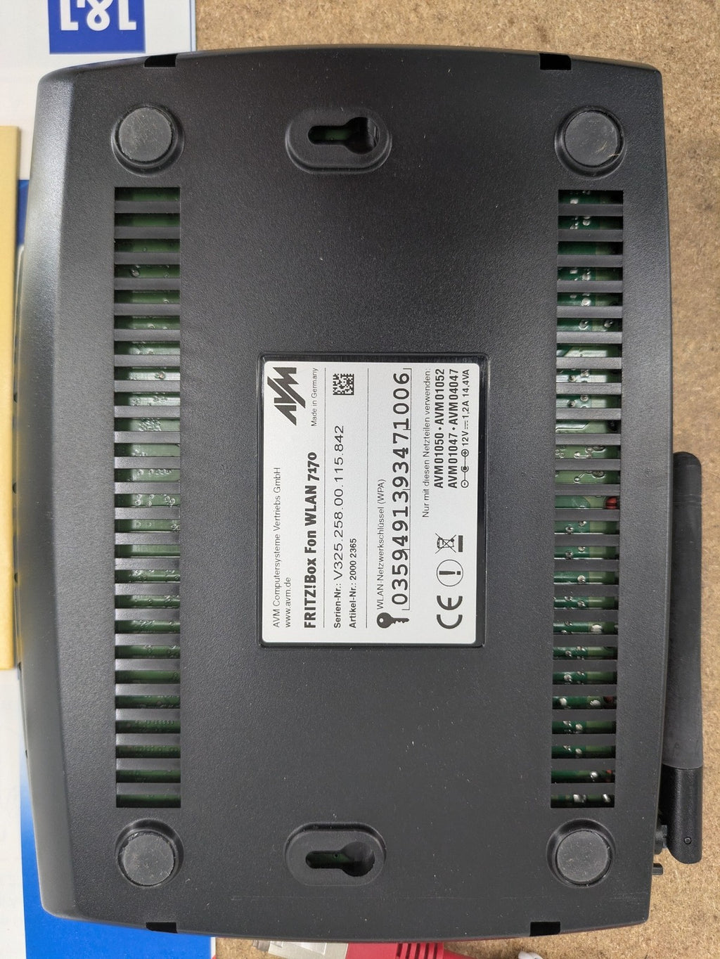 AVM VoIP gateway router blue with integrated DSL modem and phone system features.
