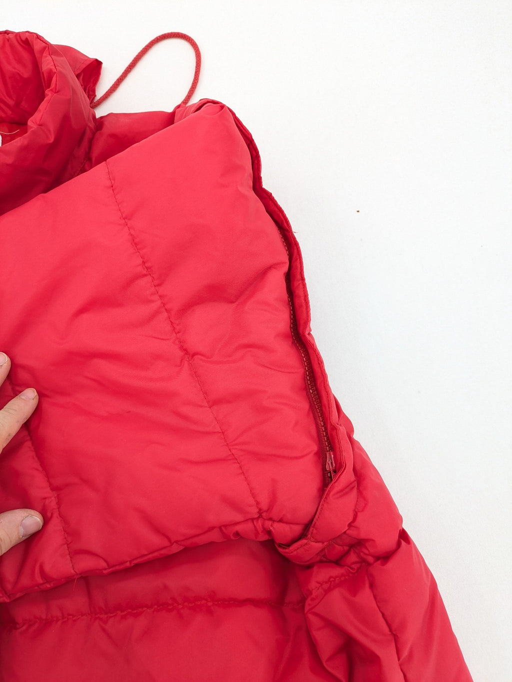 Rox red puffer vest with detachable sleeves and hood, vintage style.