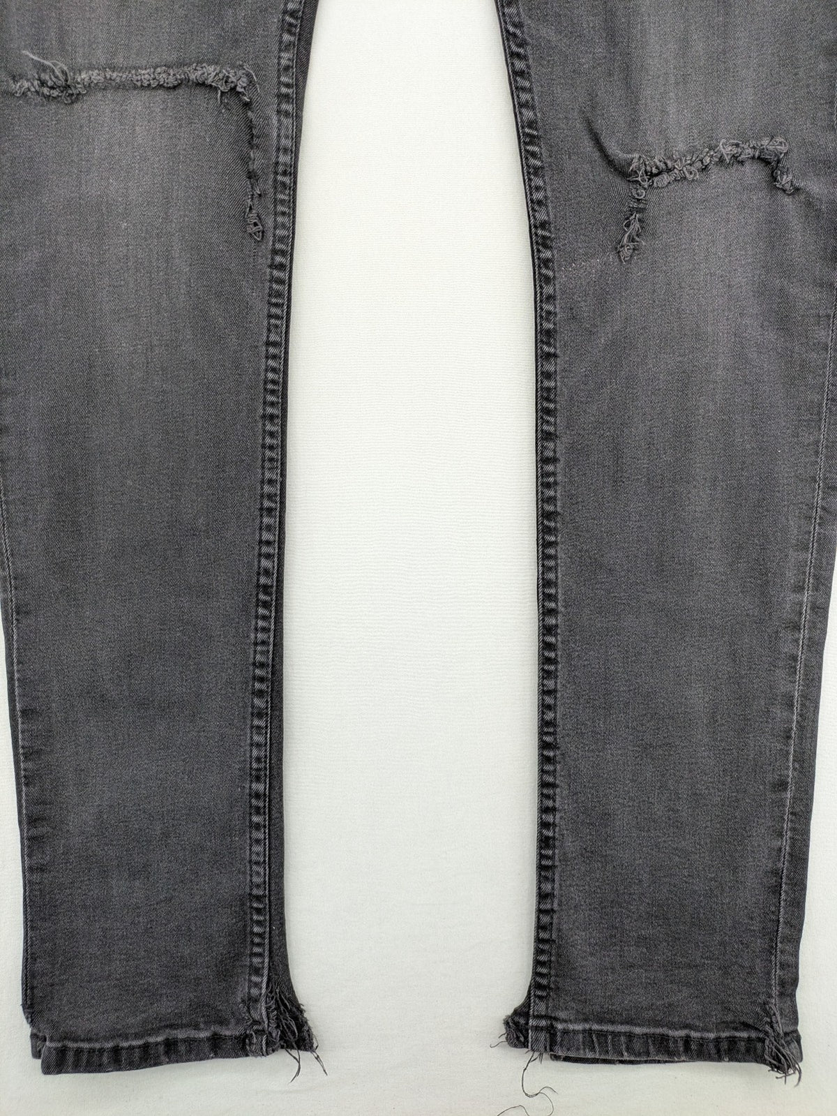 Only & Sons grey slim fit jeans with ripped details and open hem, stretch denim.