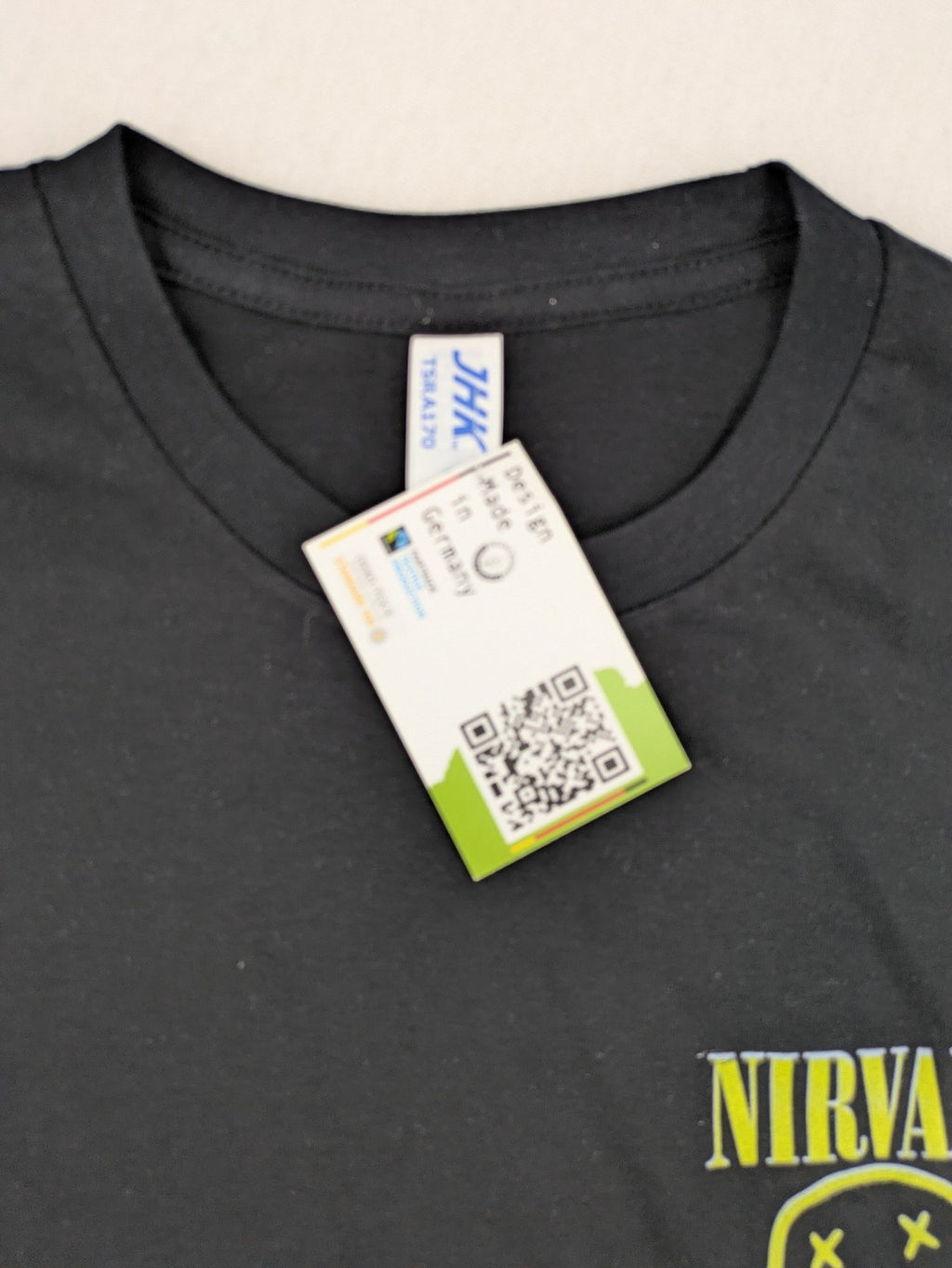 Bandshirt grey band t-shirt featuring yellow Nirvana smiley logo graphic, 100% cotton.