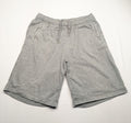 Puma grey sweat shorts with embroidered logo, made from cotton-polyester blend.