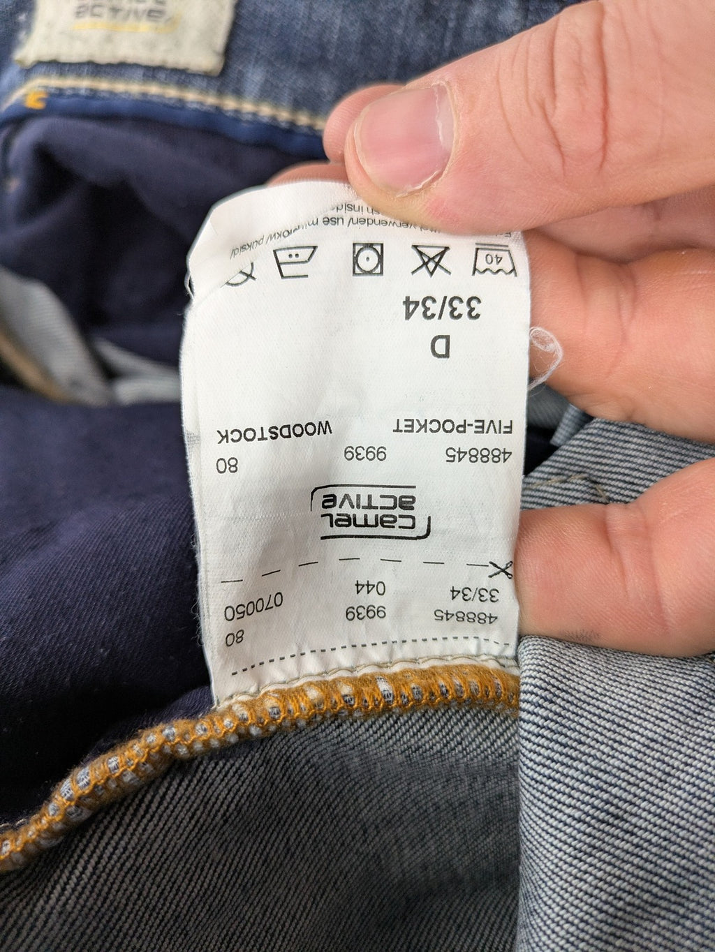 Camel Active blue straight jeans with classic 5-pocket design and logo patch.