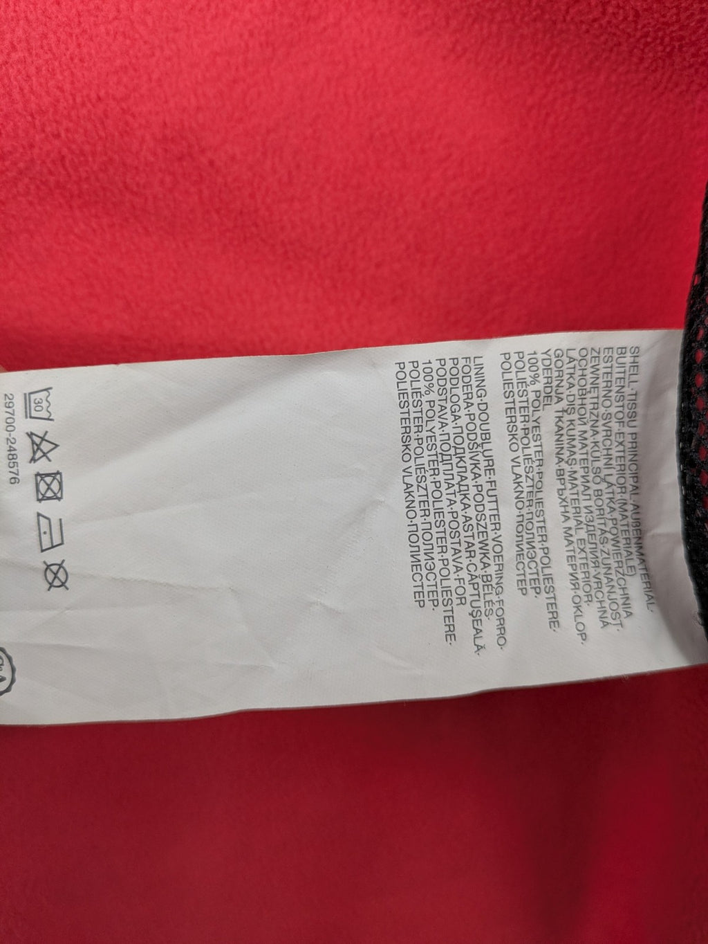 Northville grey and red softshell jacket with hood, fleece lining, and reflective elements.