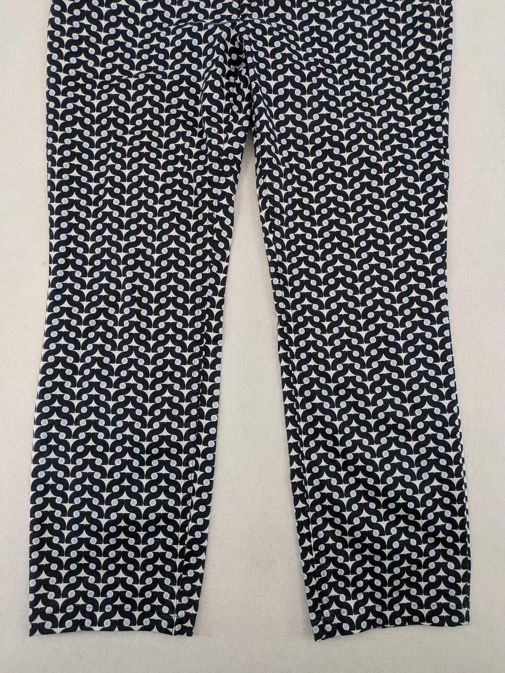Bonita navy pants with geometric pattern, stretch material, and classic zip fly closure.