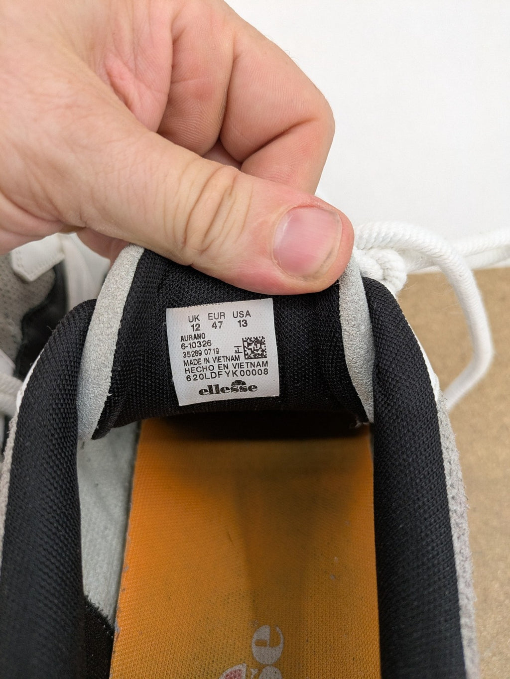 Ellesse Aurora chunky sneakers white grey with orange accents and multi-material upper.