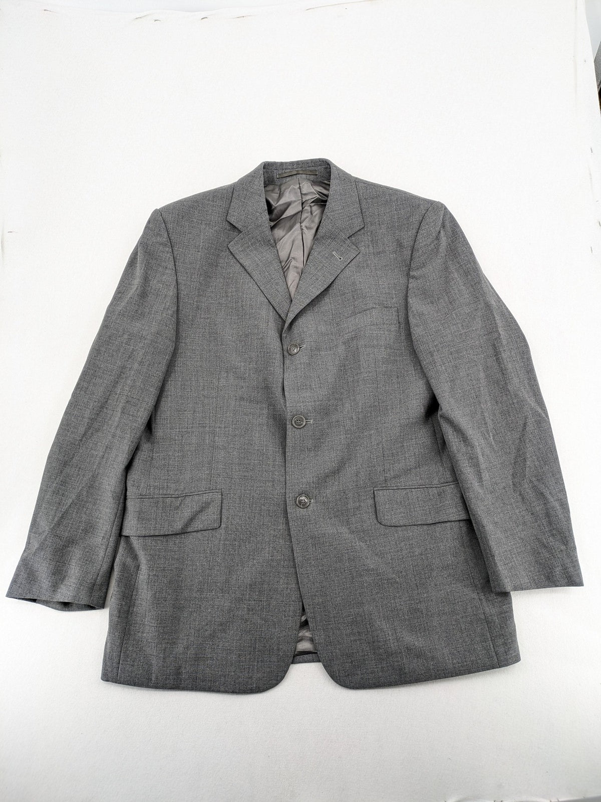 Montego grey blazer three-button design made from wool blend with smooth lining.