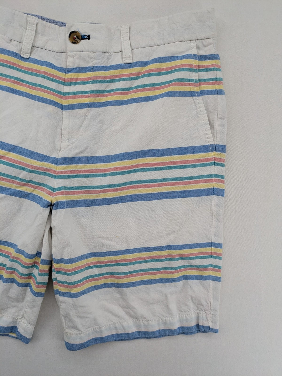 Tommy Hilfiger chino shorts blue and green striped pattern with iconic flag logo.