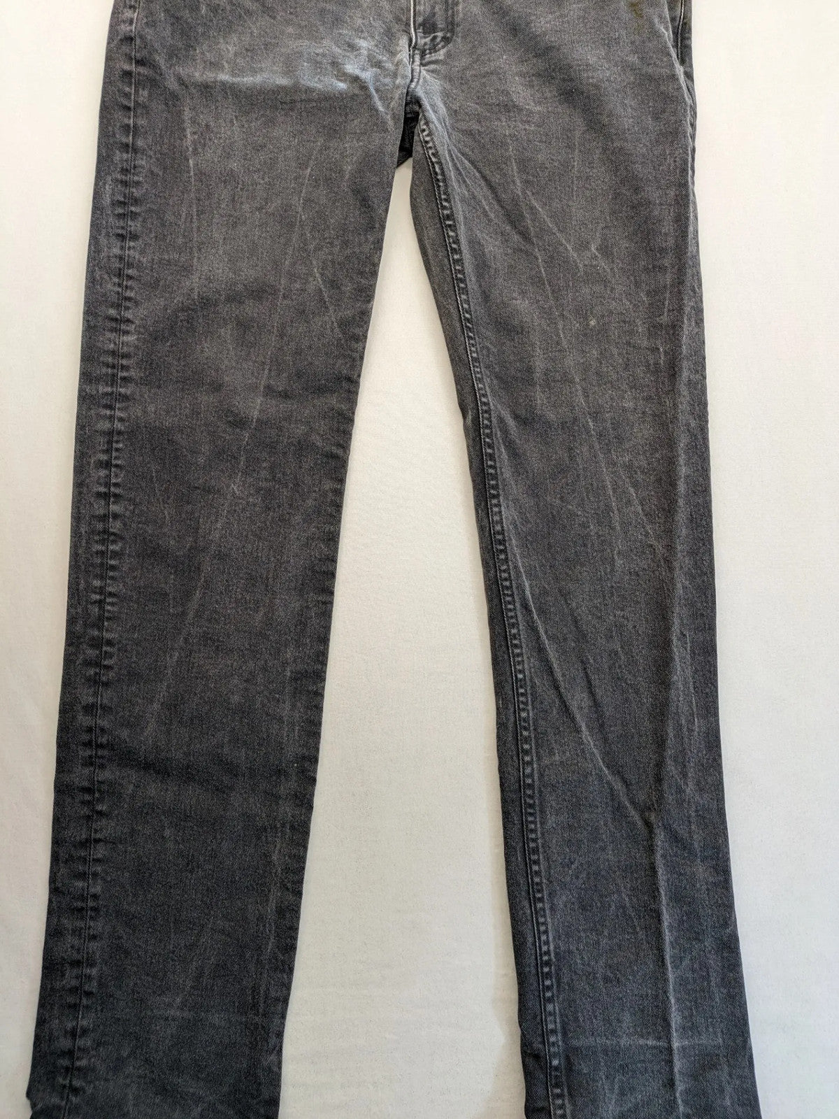 COS grey straight jeans with classic 5-pocket style and washed denim texture.