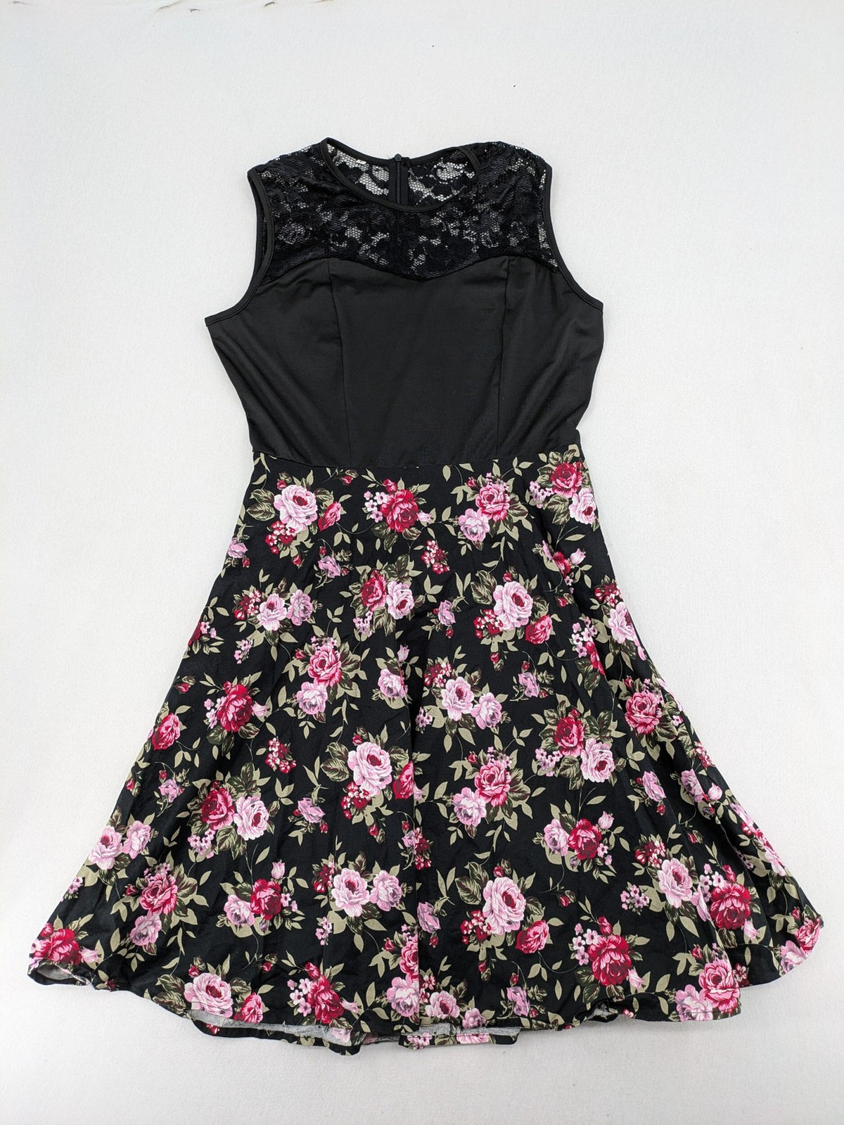M/L black A-line dress with floral skirt and lace trim details.