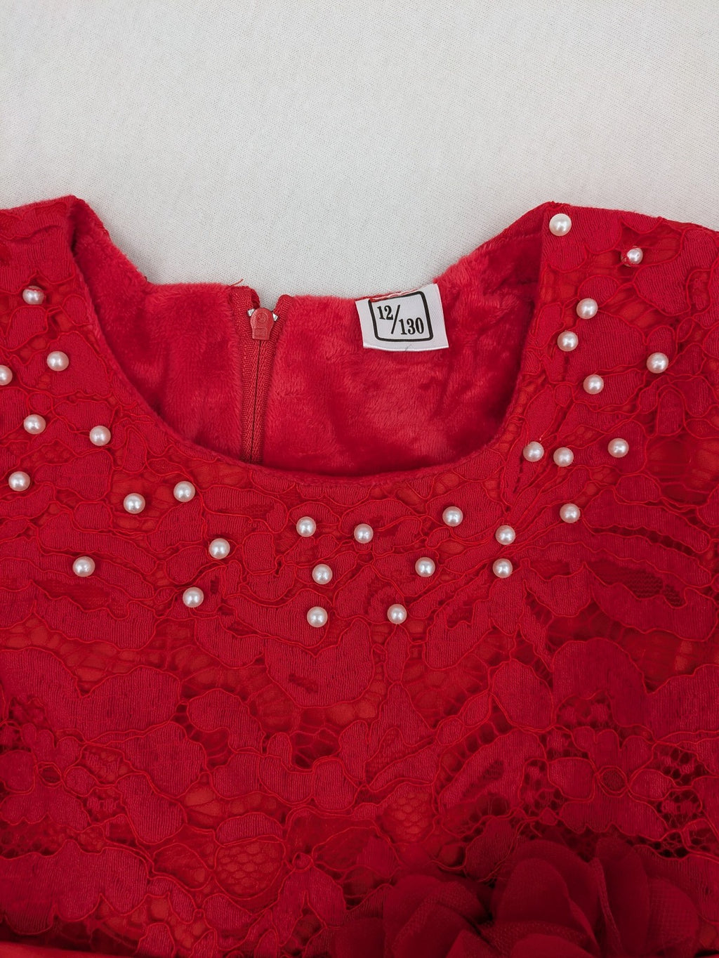 Perfekt red bridal party dress with floral lace bodice and tulle skirt, pearl embellishments.