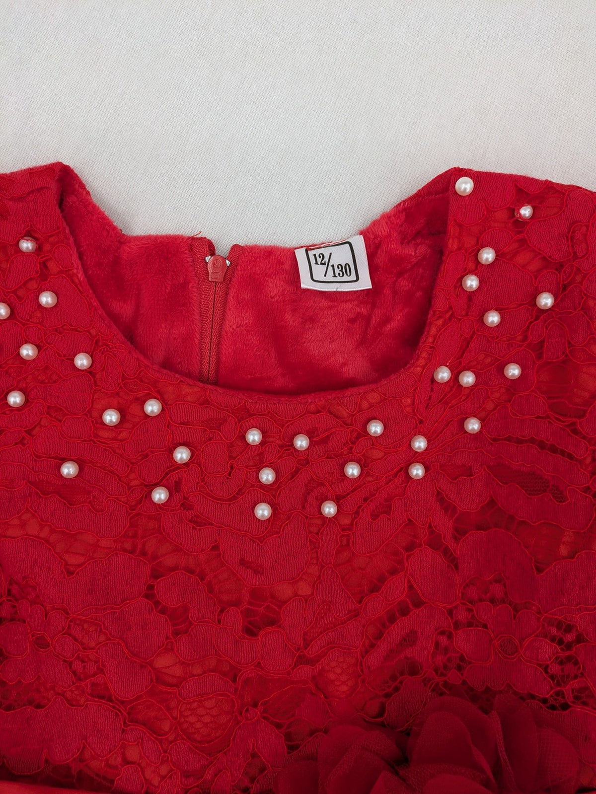 Perfekt red bridal party dress with floral lace bodice and tulle skirt, pearl embellishments.