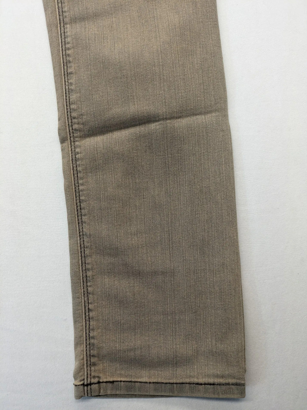 Masha khaki straight jeans with rhinestone embellishments and decorative stitching.