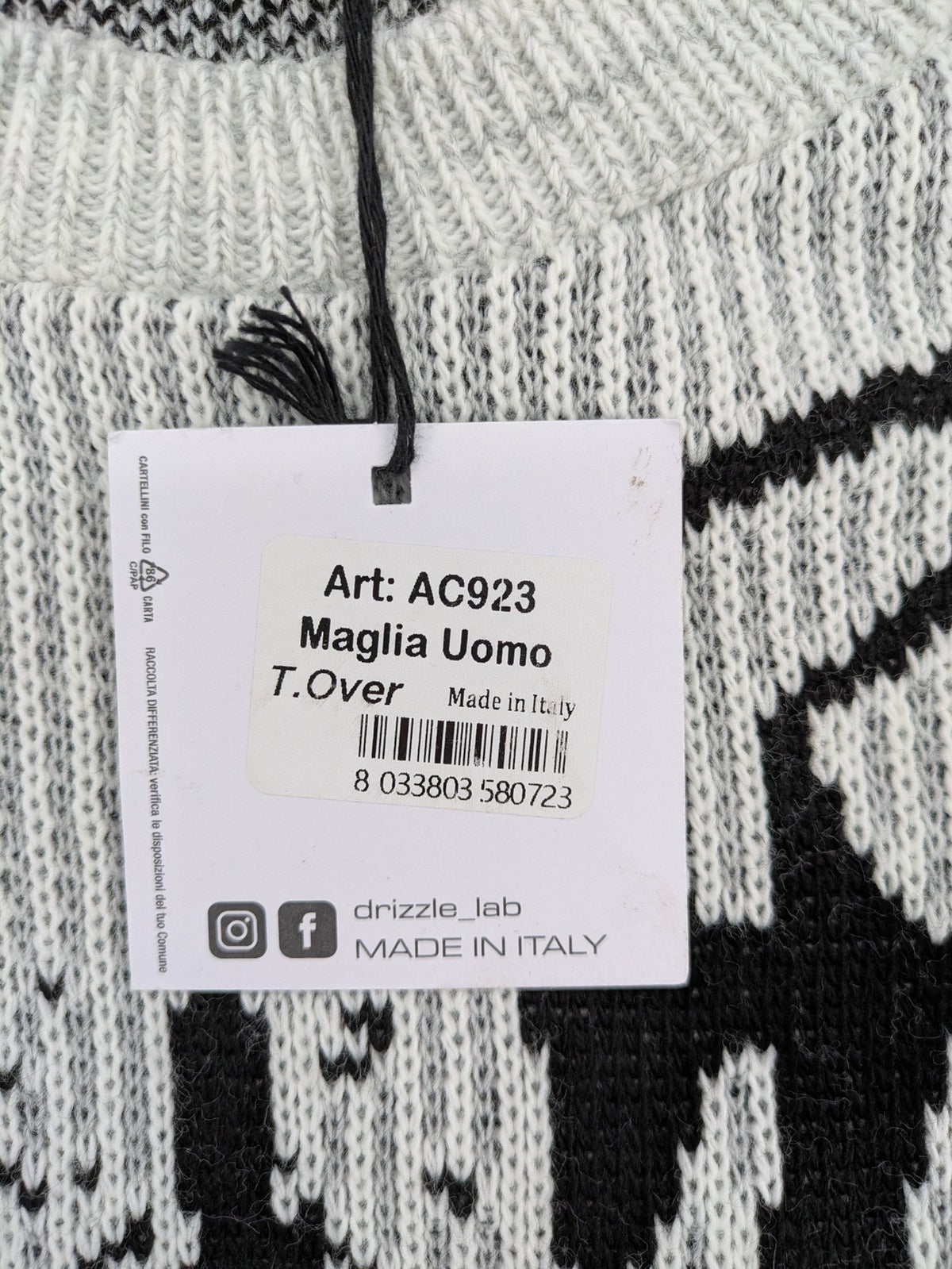 Drizzle turtle neck jumper black grey with abstract graphic print and distressed details.