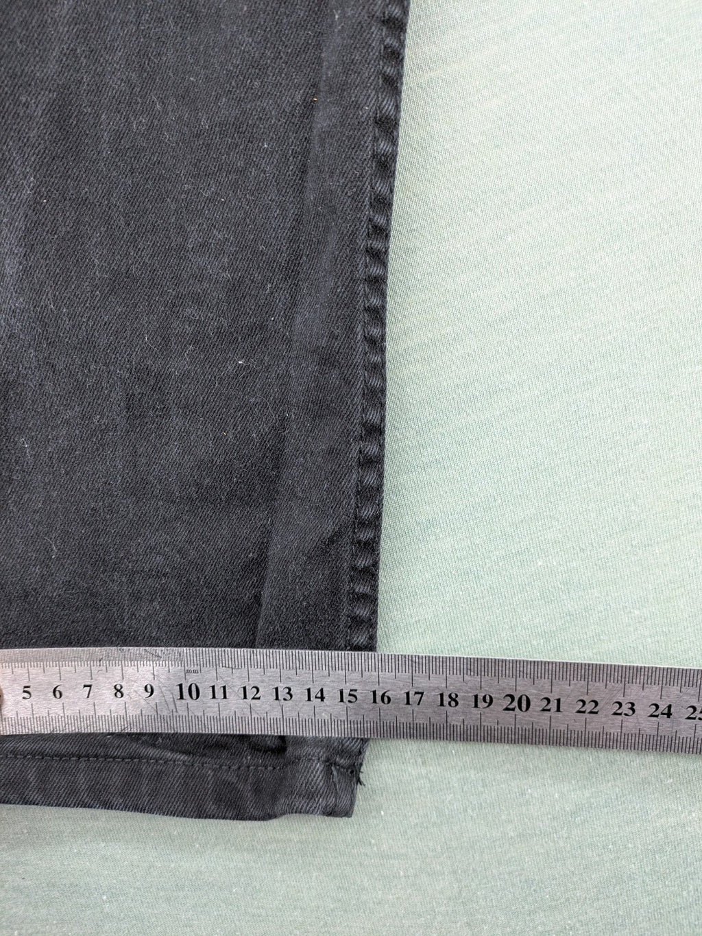Denim & Co. grey slim fit jeans with button fly and classic 5-pocket design.