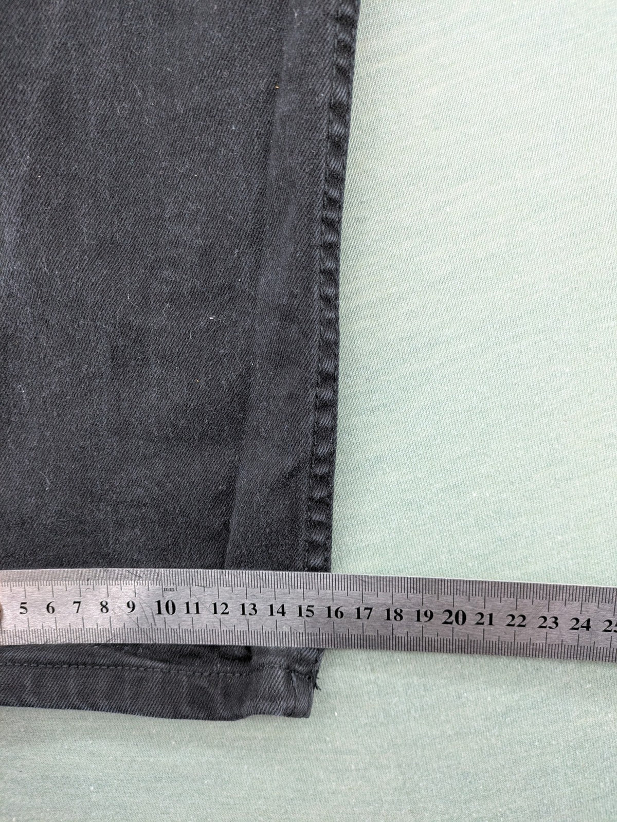 Denim & Co. grey slim fit jeans with button fly and classic 5-pocket design.