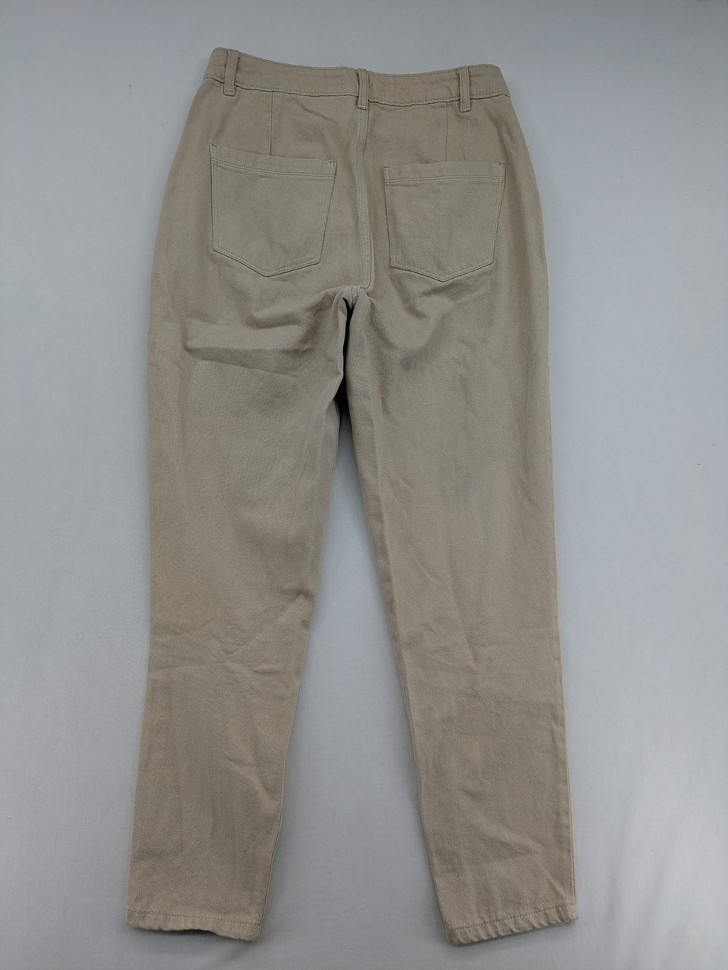 Pimkie beige mom jeans high waist tapered fit with front button placket and cotton material.