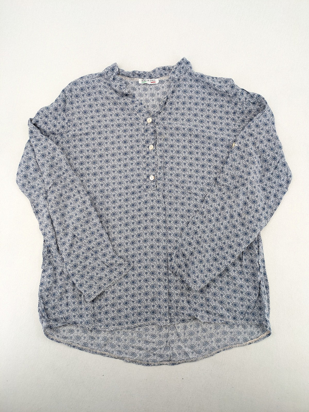 M/L blue and grey tunic top with geometric pattern and stand-up collar.