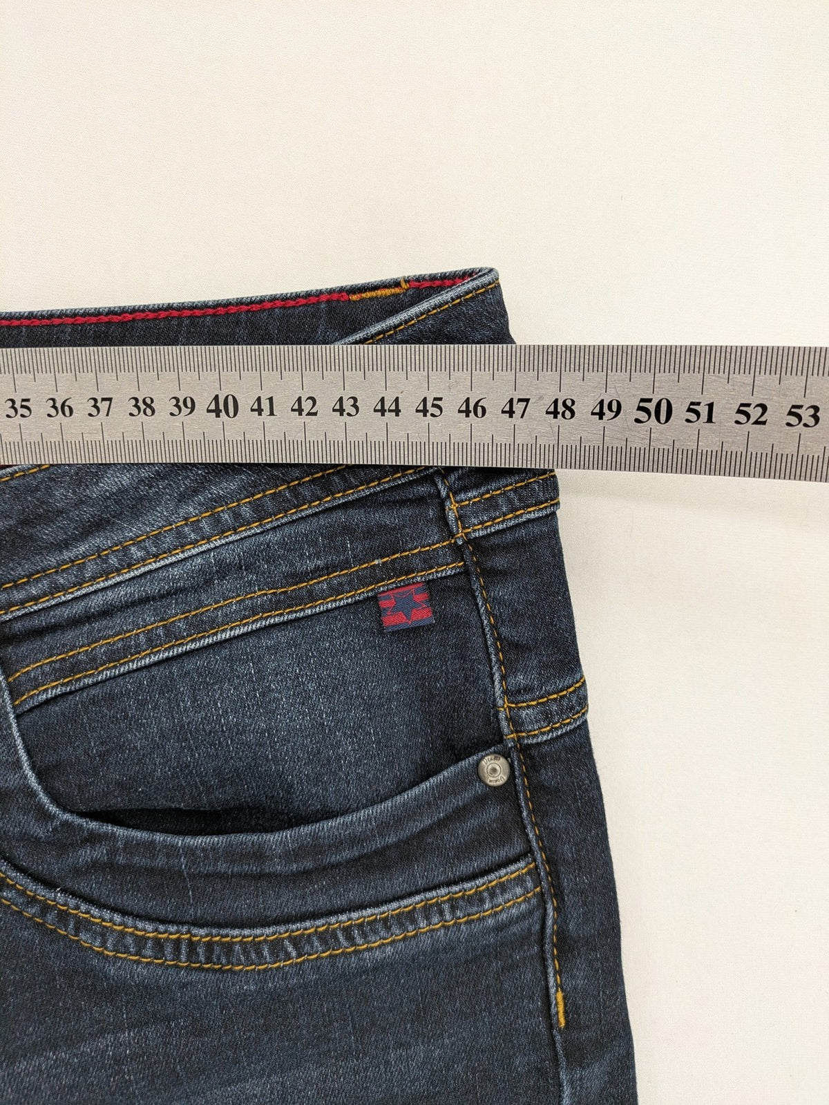 Multiblu blue straight jeans medium waist used look 5-pocket design with button and zipper.