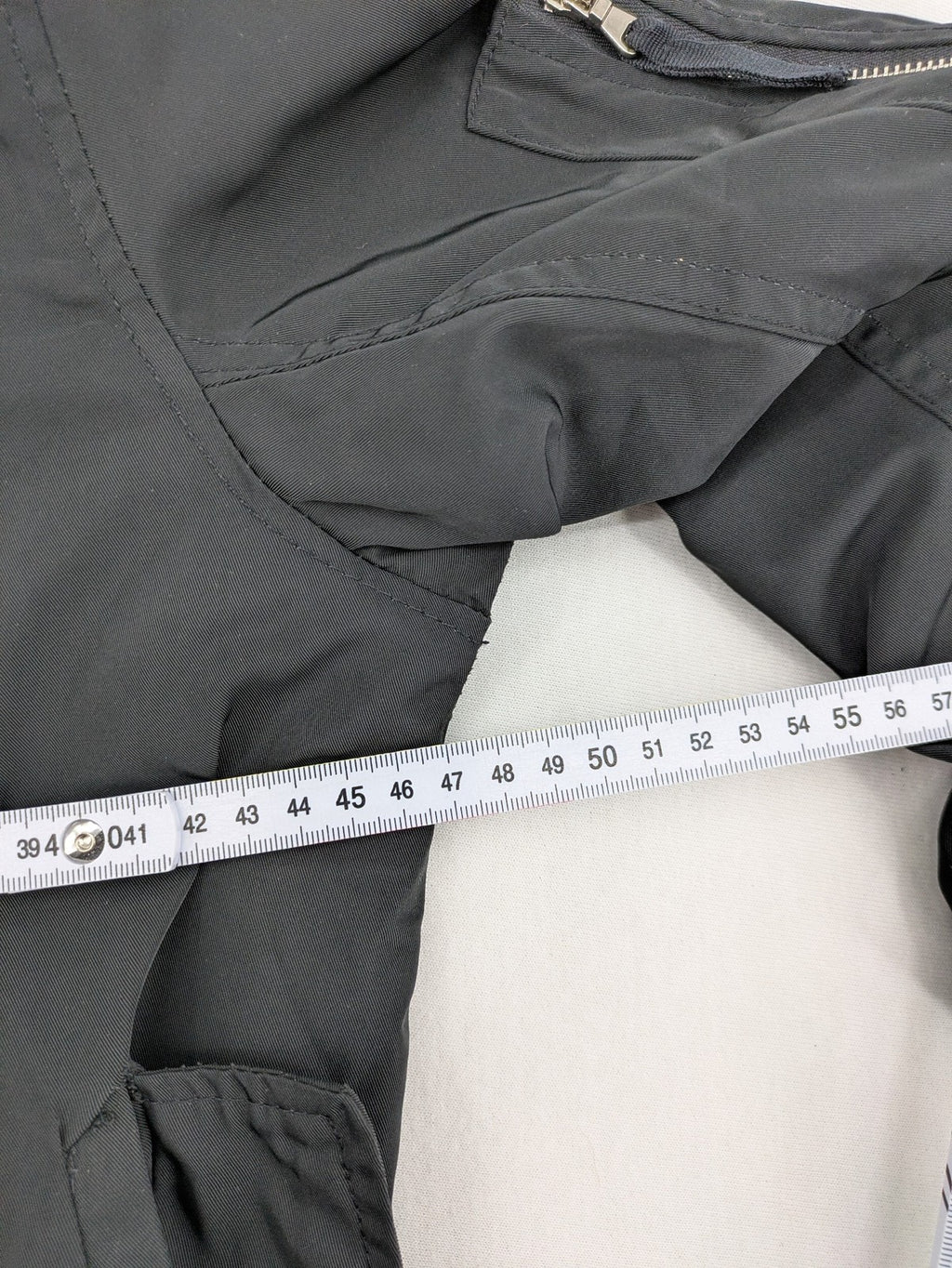 FB Sister grey bomber jacket with full zip, ribbed cuffs, and smooth polyester material.