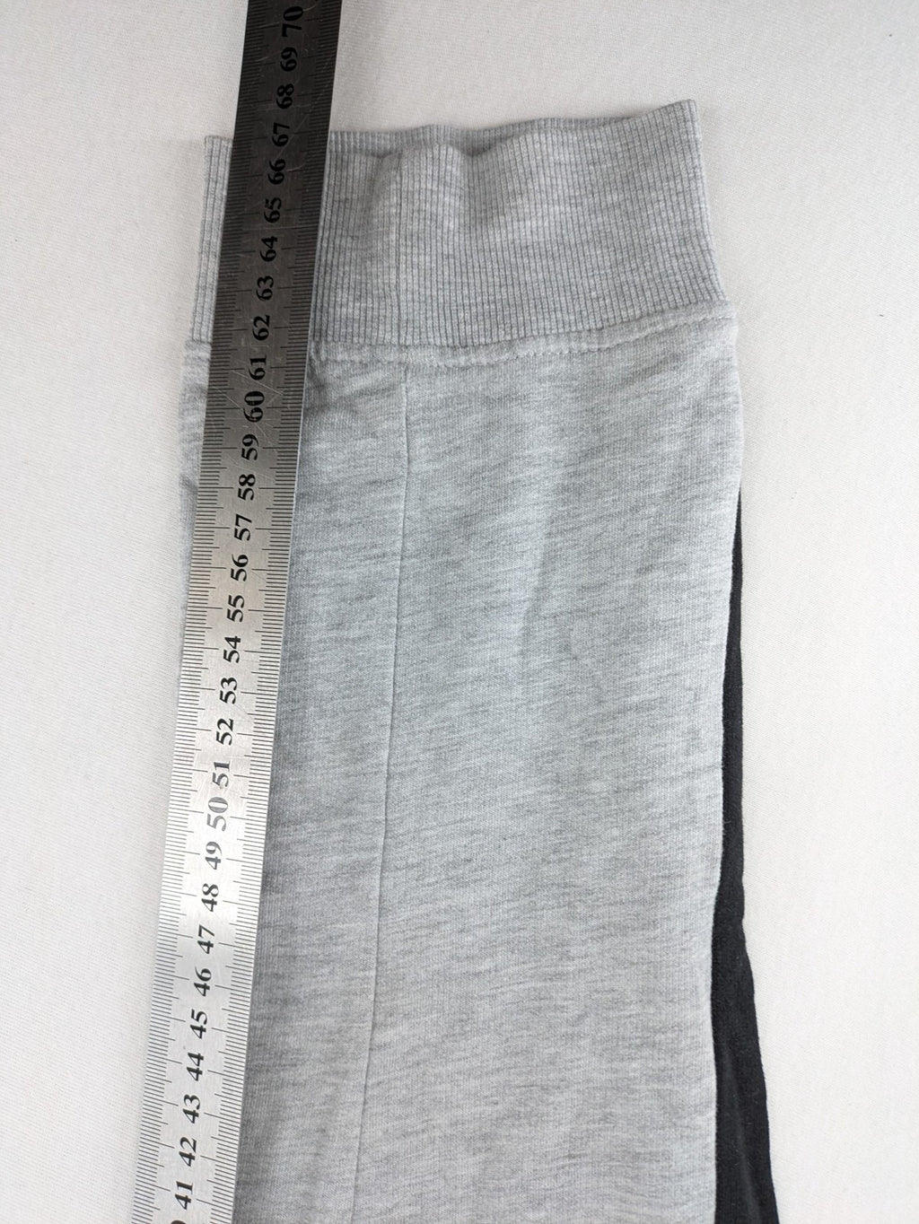 Fortnite pants grey with black side stripes and large logo print, cotton blend material.