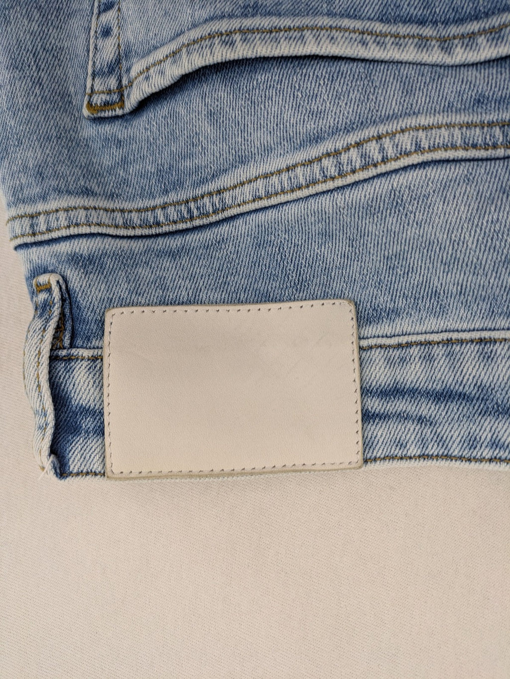 Oskar blue slim fit jeans with classic 5-pocket design and light wash.