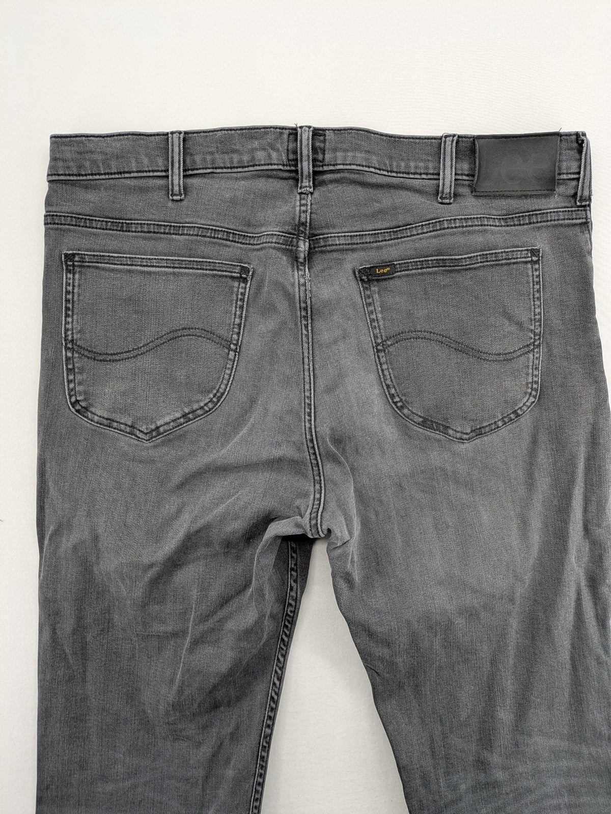Lee straight jeans grey 5-pocket design with subtle branding on back pocket.